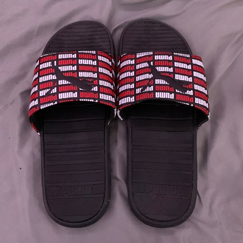 Red and Black Puma Slides.